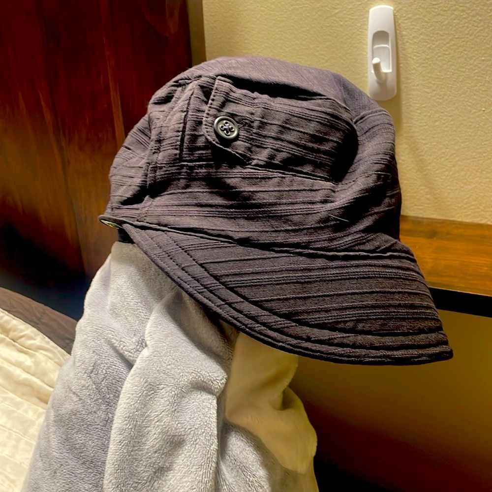 Women’s Handmade Hat. Fits like a med/large inside measurement is 24 1/2”.